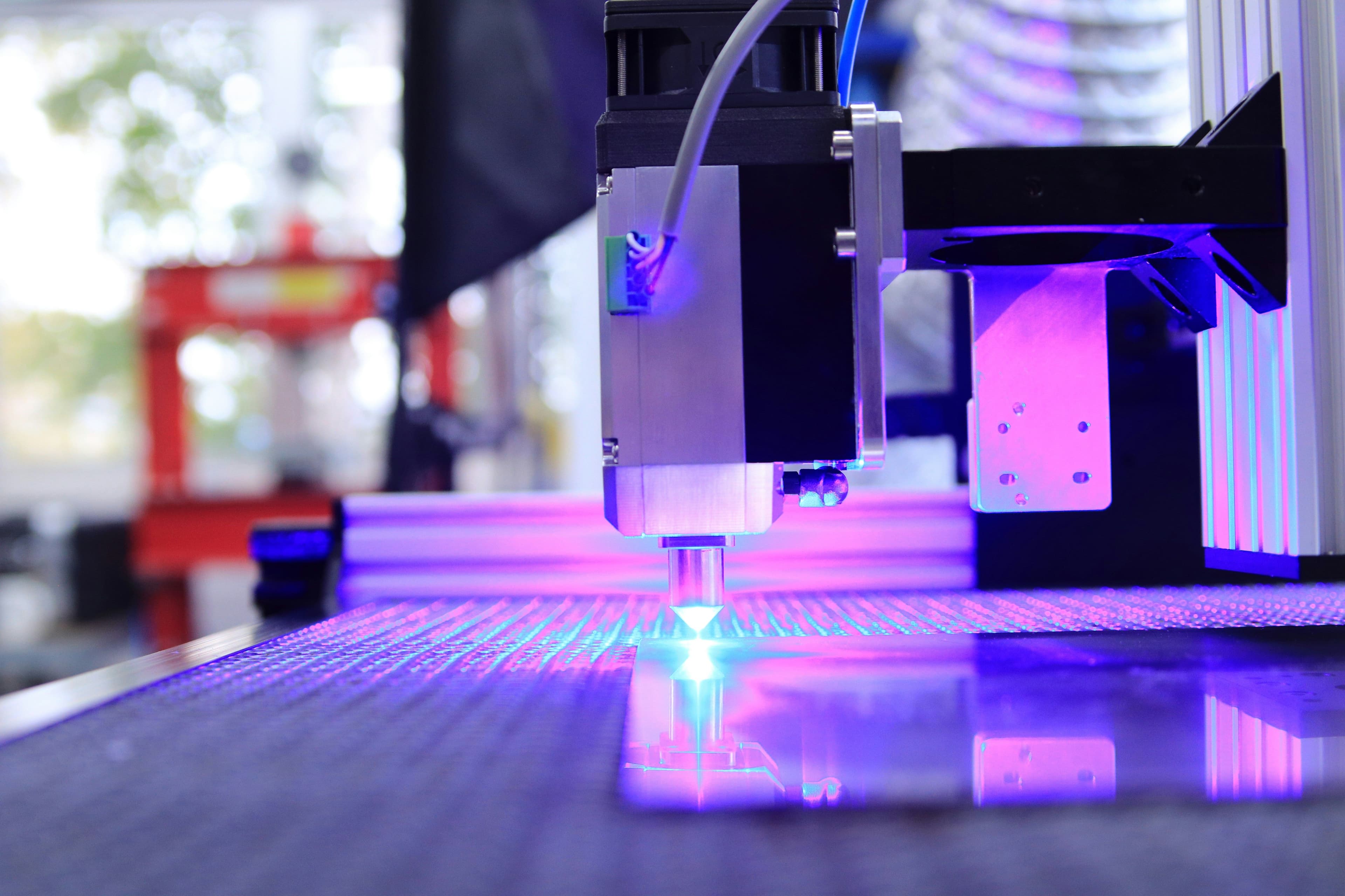 Precision laser processing for high-volume research and development